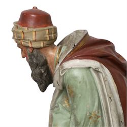 20th century painted plaster icon figure depicting one of the three wise men from a nativity sceen, kneeling and presenting his gift, H54cm 