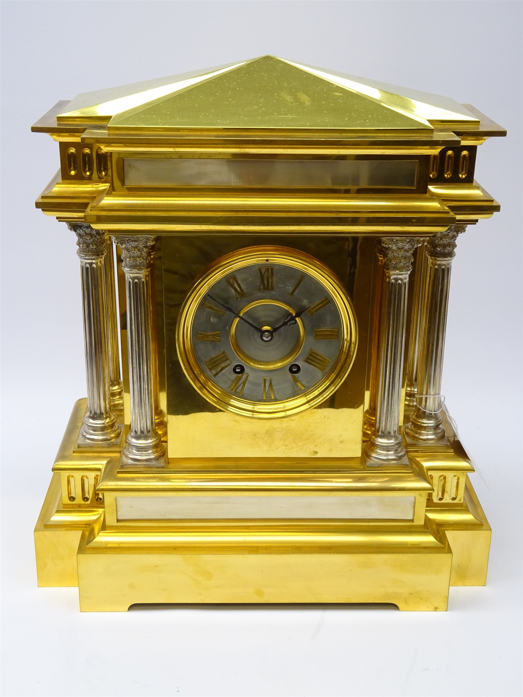 Large late Victorian brass mantel clock in the form of a Roman Temple