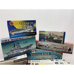 Ten plastic model kits of ships by Airfix, Revell, Dragon and Skywave, predominantly 1/600th scale including R.M.S. Titanic, HMS Invincible, two x HMS Ark Royal, HMS Fearless, HMS Hood, HMS Belfast, Bismarck etc; all boxed, most in factory sealed transparent packaging (10)