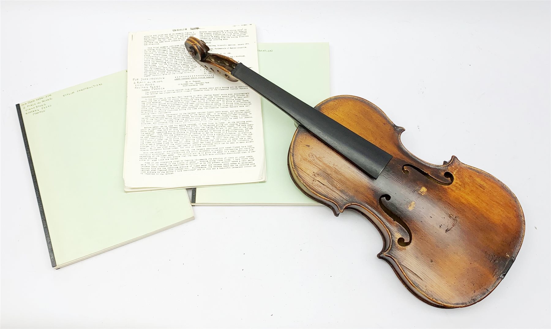 Late 19th century German violin for completion with 36cm one-piece maple back and ribs and spruce top, bears label Copie De Albani Palermo 1633, 59cm overall together with three books on violin construction, restoration and varnishing  