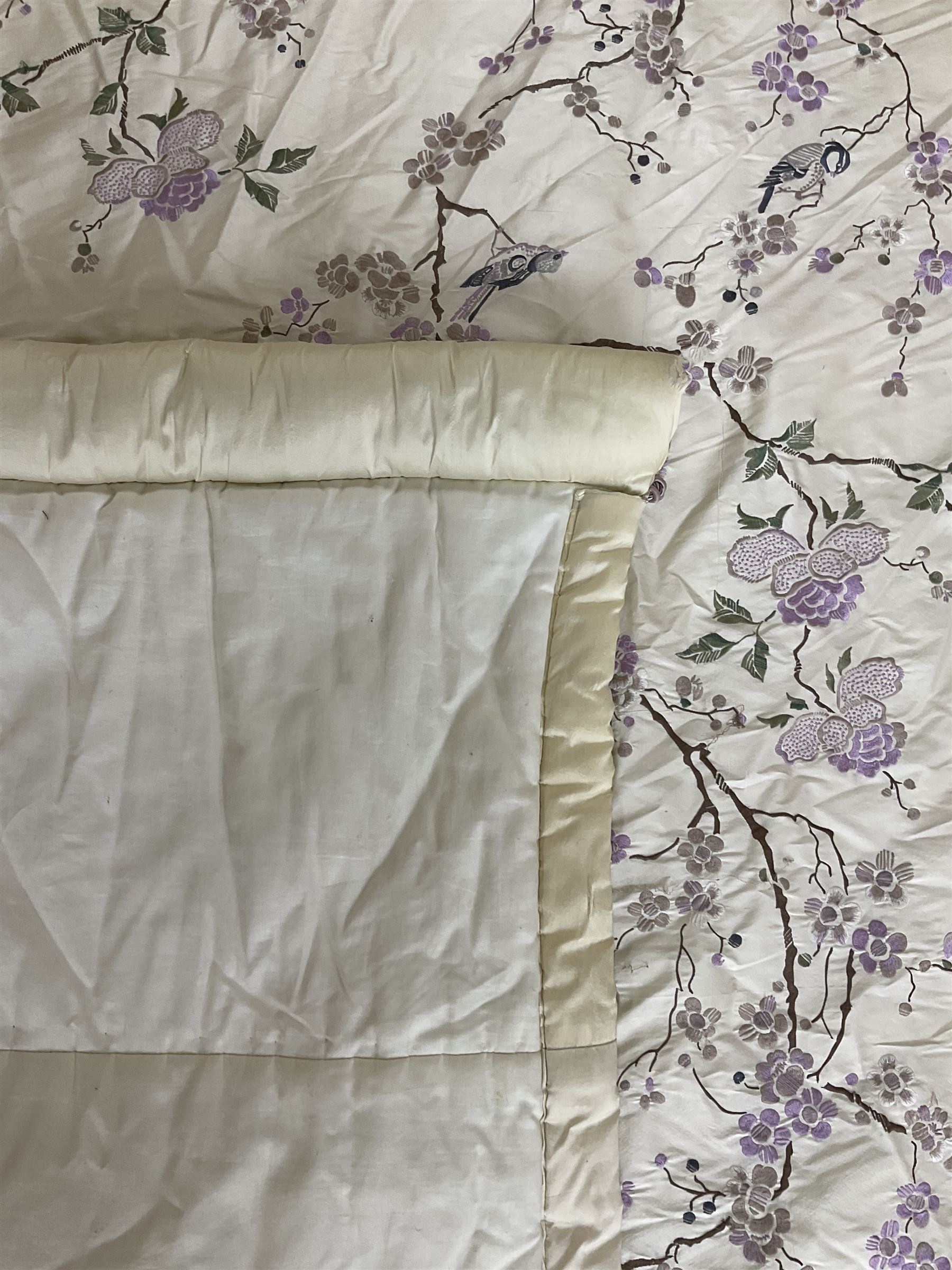 5' Kingsize headboard with stepped arch cresting, upholstered in cream silk with raised stitching decorated with trailing foliage branches and birds; matching bedspread (251cm x 218cm); two matching cushions  