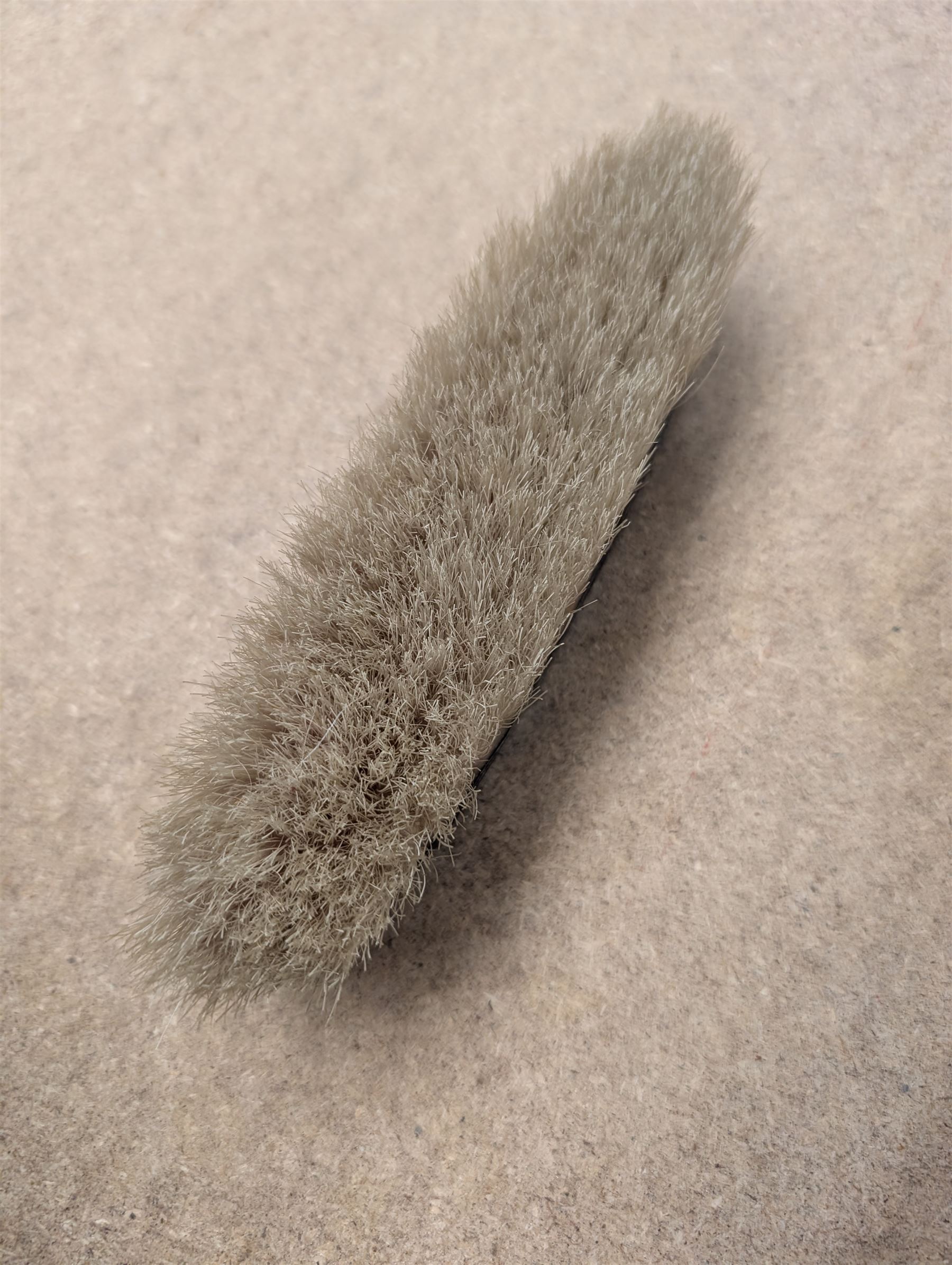 Silver mounted hand mirror and clothes brush, both hallmarked 