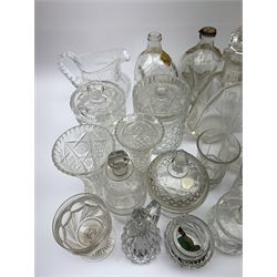 A number of Victorian tumblers and Edwardian drinking glasses, together with a large quantity of other later glassware, to include a glass table lamp base, drinking glasses of various forms, a number with cut decoration, other assorted cut glass including jug, vases, jars and covers, etc. 