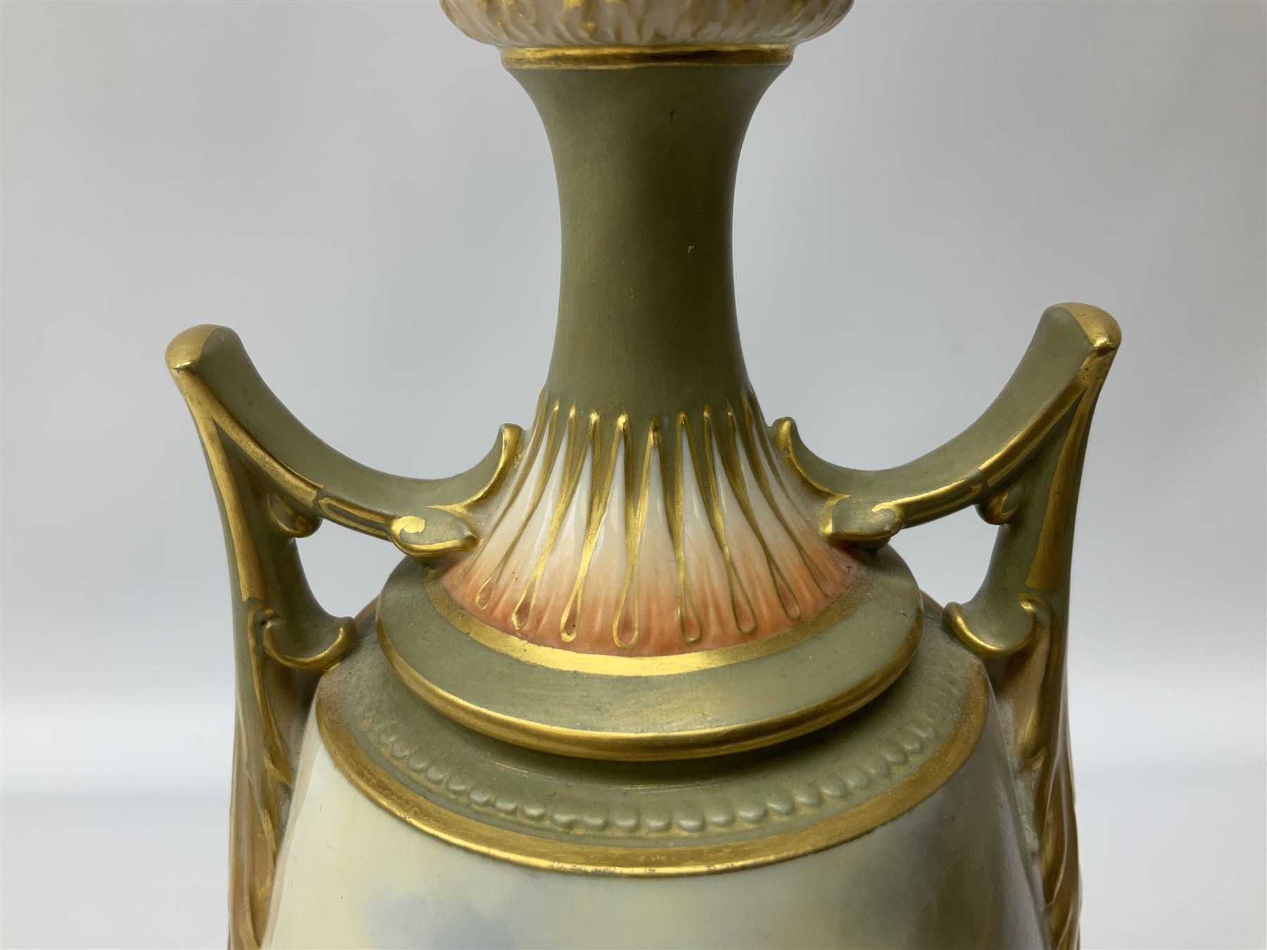Early 20th century Royal Worcester vase decorated by Harry Davis, of ovoid form with twin acanthus mounted handles and waisted high neck supporting a domed cover, upon a circular foot, the body hand painted with sheep in a highland landscape, signed H Davis, with puce printed marks beneath including shape number 2425, and date code for 1907, H27.5cm