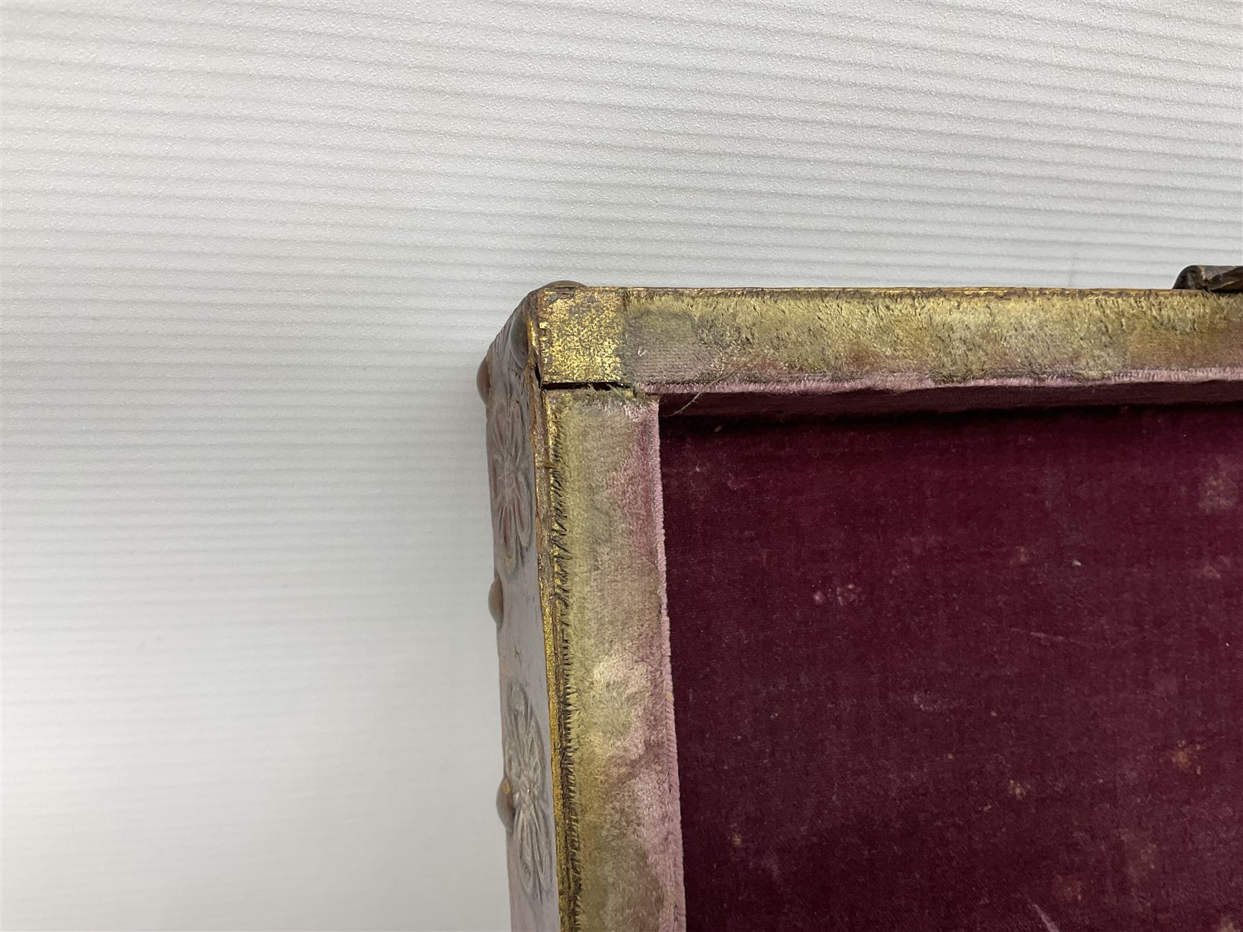 20th century box, decorated in faux leather with the royal coat of arms and GR 1719 to hinged cover, with fleur-de-lis, lion, crown and rose motifs throughout and studs to all edges, opening to reveal a purple velvet interior containing three removable wooden trays, H18.5cm