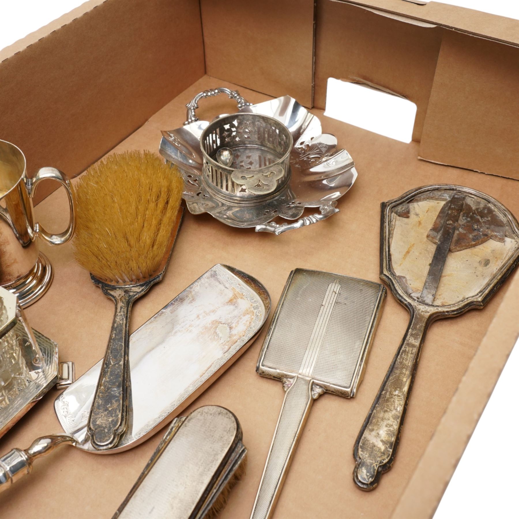 Silver backed brushes and mirrors,plated six bottle cruet, crumb scoop, tankard, plated frame and chromium dish