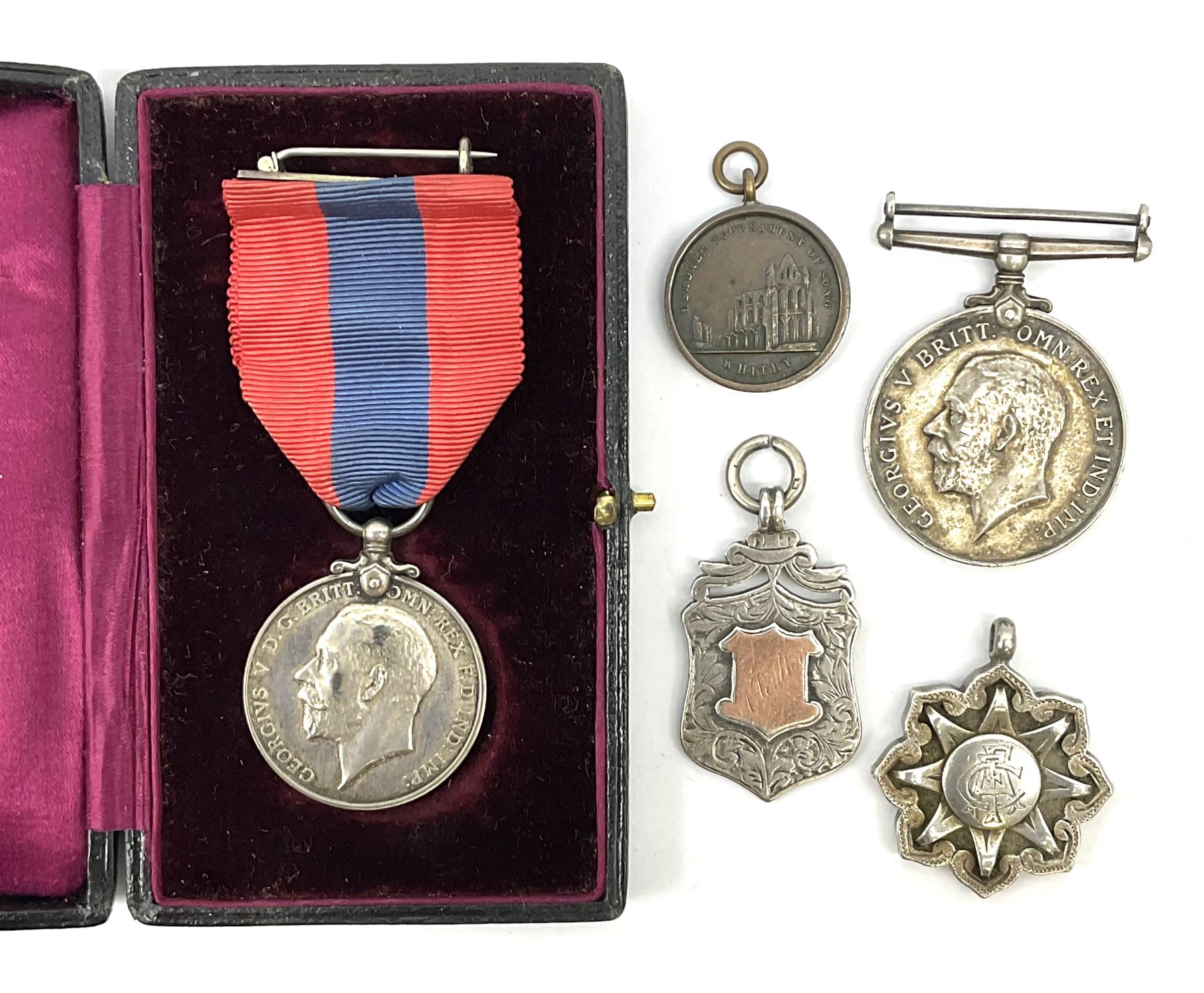 George V Imperial Service Medal awarded to Arthur Poulter, cased; and two Victorian silver sporting fobs inscribed A. Poulter and dated 1896 and 1898; together with WW1 British War Medal awarded to R4-068401 Pte. R. Burnett A.S.C.; and an uninscribed bronze singing medallion (5)