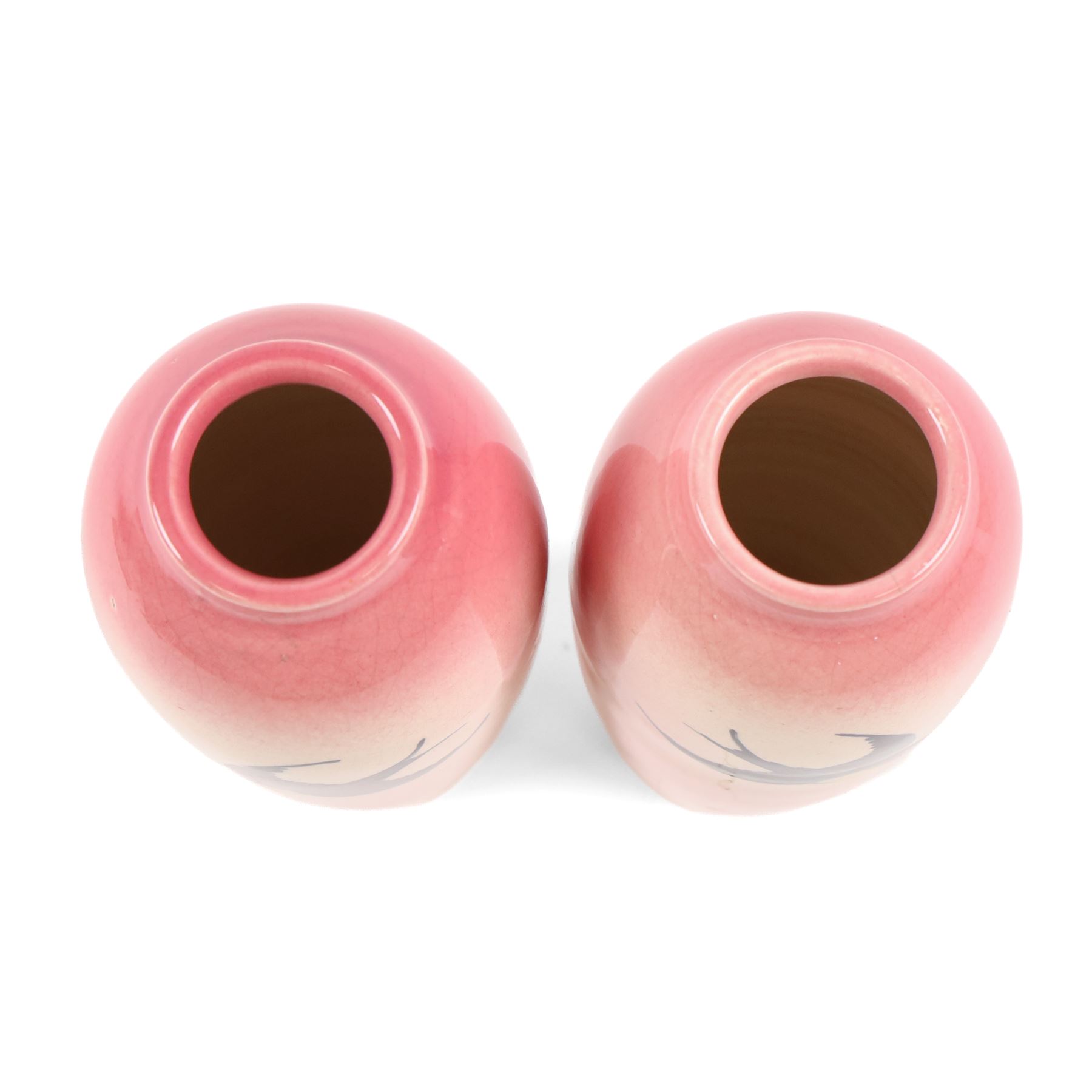 Pair Ault Pottery vases, decorated with swallows in flight upon a pink ground, H22cm