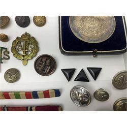 WW2 group of eight medals comprising 1939-1945 War Medal, Defence Medal, 1939-1945 Star, Africa Star, Italy Star, France & Germany Star, 1935 Silver Jubilee and Long Service and Good Conduct Medal with integral Regular Army clasp awarded to 5719825 Sjt. A.W. Hatchard Dorset R.; all with ribbons and ribbon bars; cased hallmarked silver and bronze Dorset Regiment 'Davidson Medals'; and quantity of military, NFS/AFS and other buttons and badges etc
