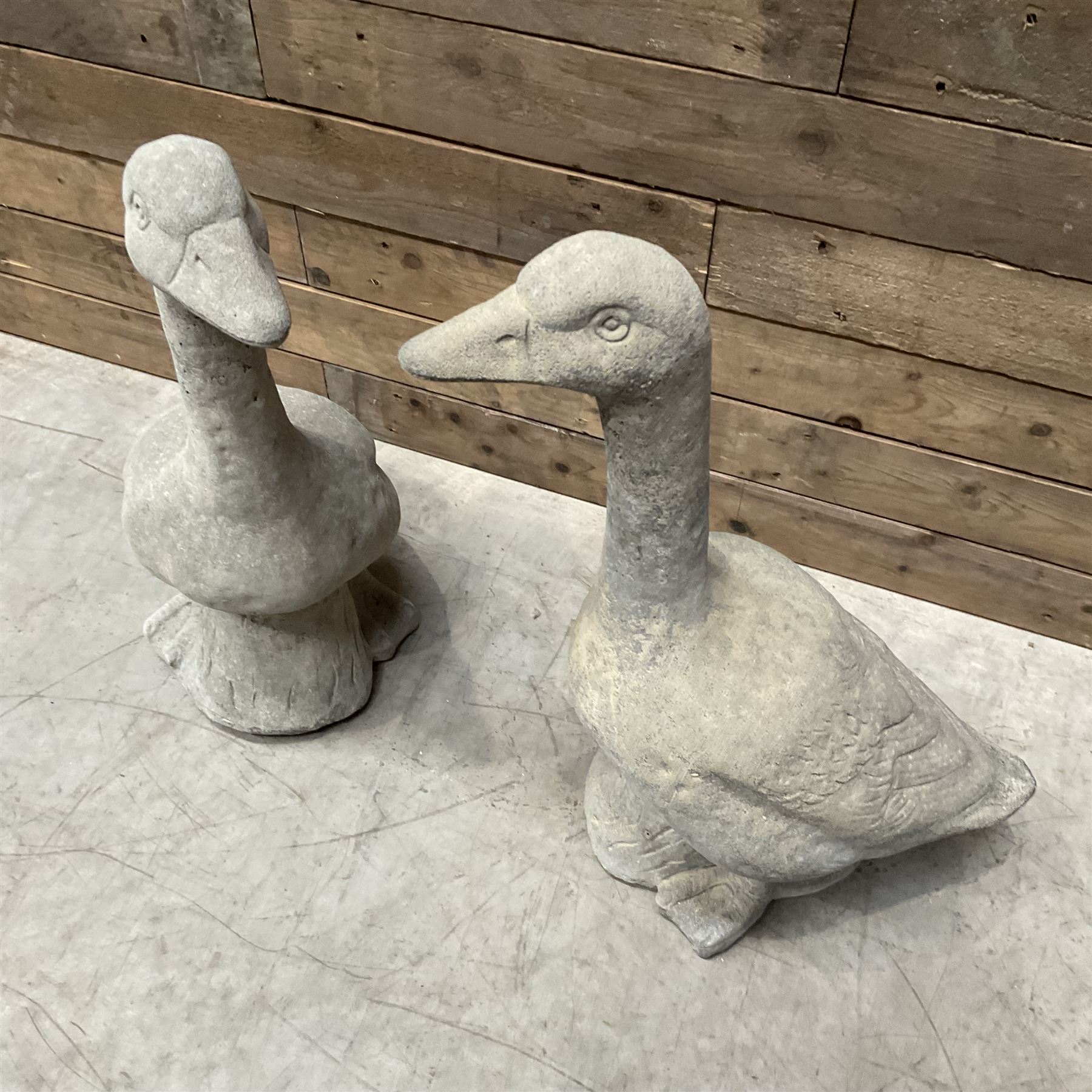 Pair of cast stone garden geese