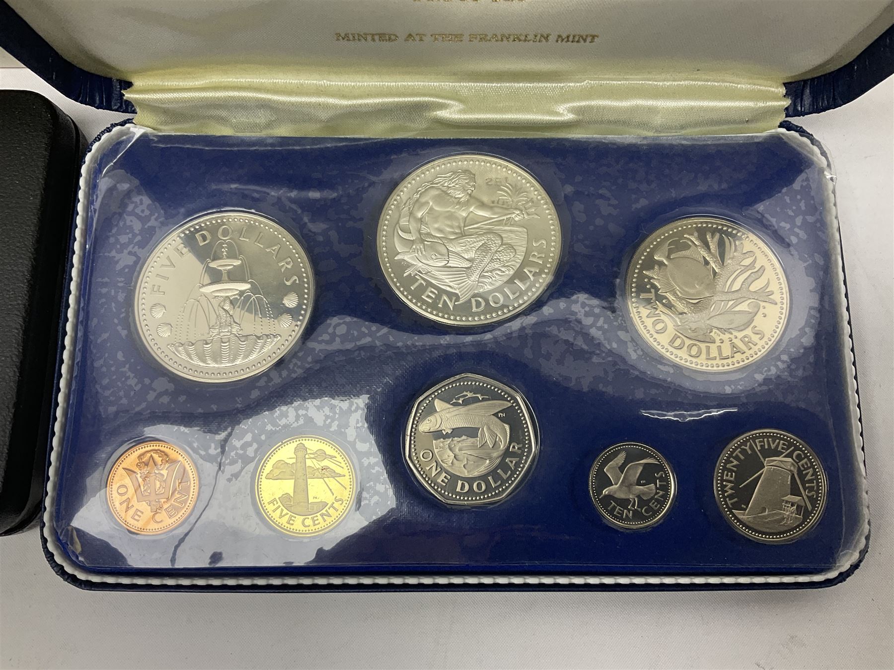 First National Coinage of Barbados 1973 proof eight coin set, from ten dollars to one cent, the ten dollar coin minted in sterling silver, the five dollar coin minted in 800 silver, and a Barbados 1974 proof eight coin set, both minted at The Franklin Mint, cased with certificates; two Republic of Malta decimal proof coin sets, dated 1978 and 1979, the 1979 one pound coin minted in sterling silver, both minted at The Franklin Mint, cased with certificates; Cayman Islands 1973 proof eight coin set, minted at the Royal Canadian Mint, cased; and a Cayman Islands 1979 proof eight coin set, the five dollar to fifty cents coins each minted in sterling silver, minted at the Franklin Mint, cased with certificate (6)