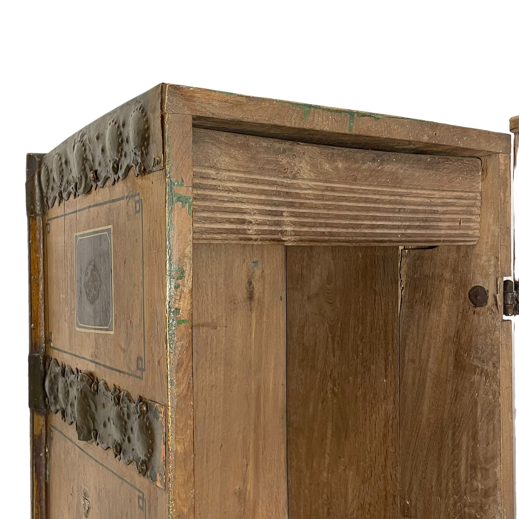 19th century painted oak sea chest, hinged dome top enclosing small compartment, bound by shaped and pressed metal strapwork, scumbled finish to resemble oak and painted with small vignettes depicting portraits and landscapes within panels, fitted with large wrought metal carrying handles, the front inscribed 'H.J.S. 1870' 