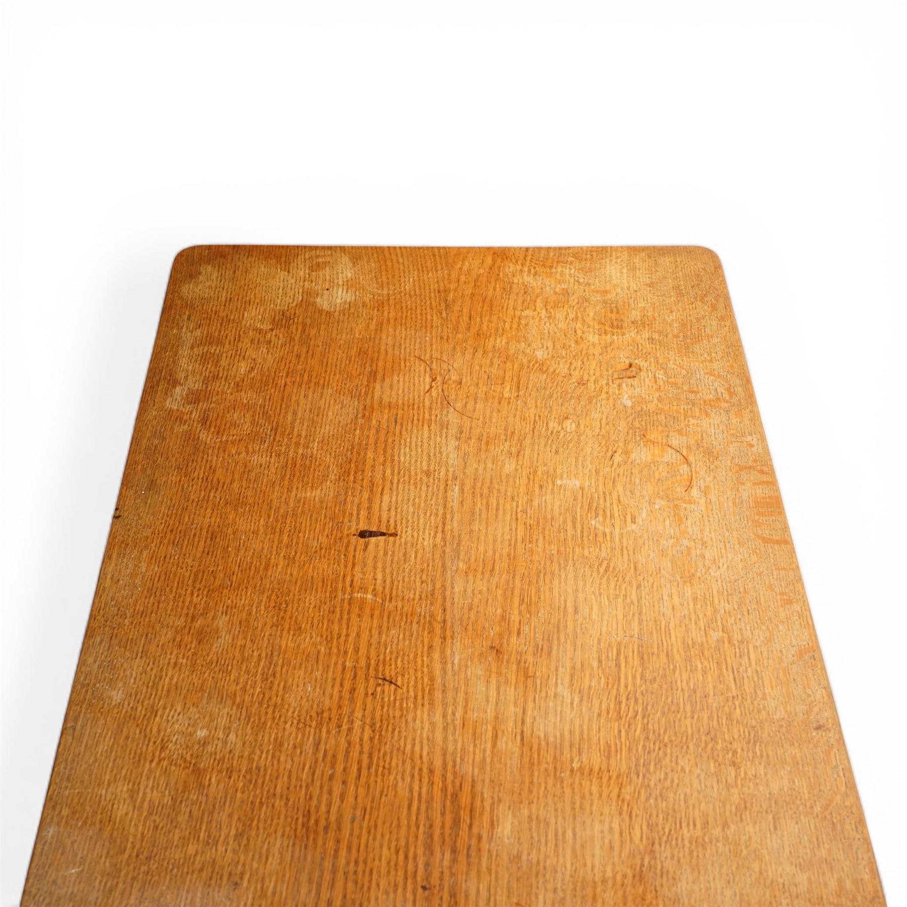 Mouseman - oak side table, rectangular adzed top, raised on octagonal supports united by stretcher on sled feet, with carved mouse signature, by the workshop of Robert Thompson of Kilburn