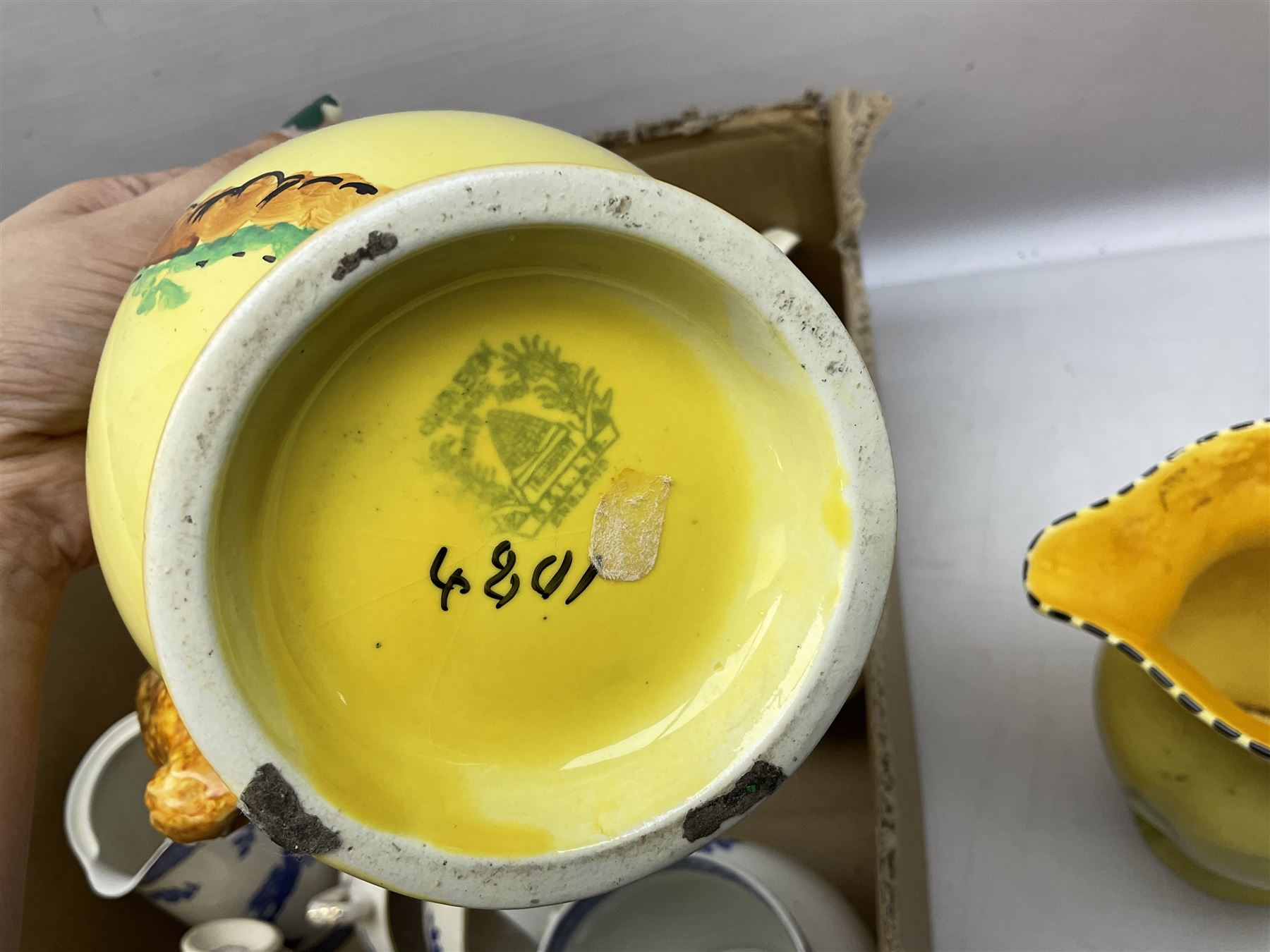  Burleigh ware jug with squirrel handle, together with similar falcon ware jug,  Shelley vase decorated in an orange colourway with fluted rim, and Royal Cauldon Dragon pattern tea and dinner wares, in two boxes