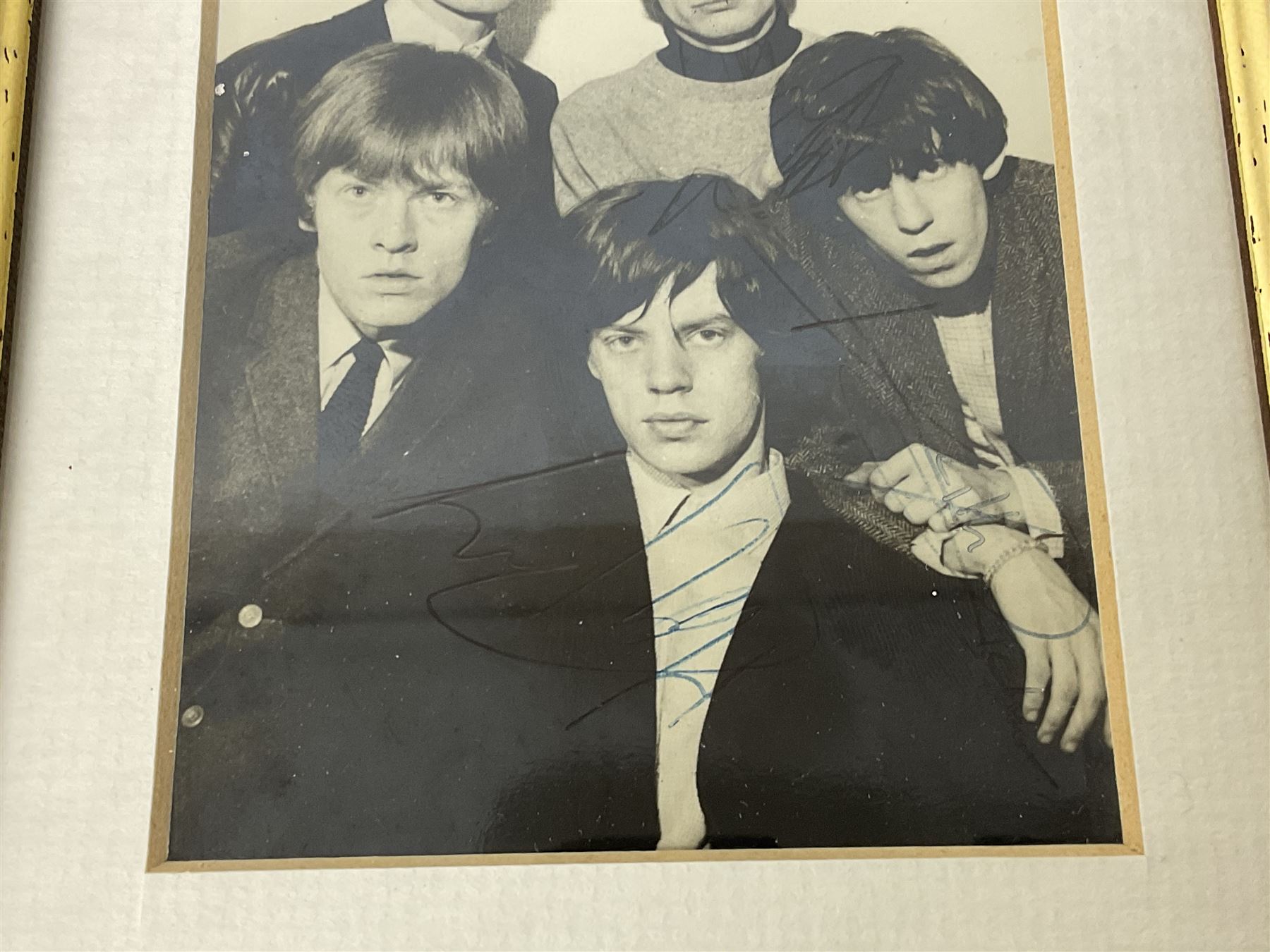1960s autographed photographic postcard of The Rolling Stones showing Mick Jagger, Brian Jones, Keith Richard, Bill Wyman and Charlie Watts; signed in ink by all five members 13 x 9cm in modern mount and frame; together with a programme for the performance where the signatures were obtained supporting The Everly Brothers presumably at The Doncaster Gaumont as the date of this venue is hand written on the inside.