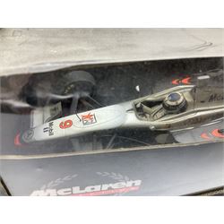 Two Collezione Classico large scale die-cast models of a Ferrari 1972 312P with Racing Fuel Pump and Ferrari 1958 250 Testa Rossa with Road Fuel Pump; and two Minichamps 1:18 scale models of a McLaren Mercedes Racing Car and Auto Union Typ C racing car; all boxed (4)