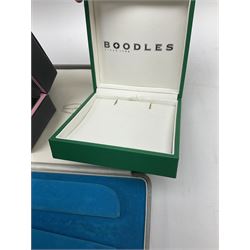 Collection of jewellery boxes including a vintage Boodle & Dunthorne bracelet box, two modern Boodles boxes, two Cartier Santos 701 sunglasses cases, one other Cartier box, Harrods cufflink/ring box and a Penlington & Batty necklace box (8)