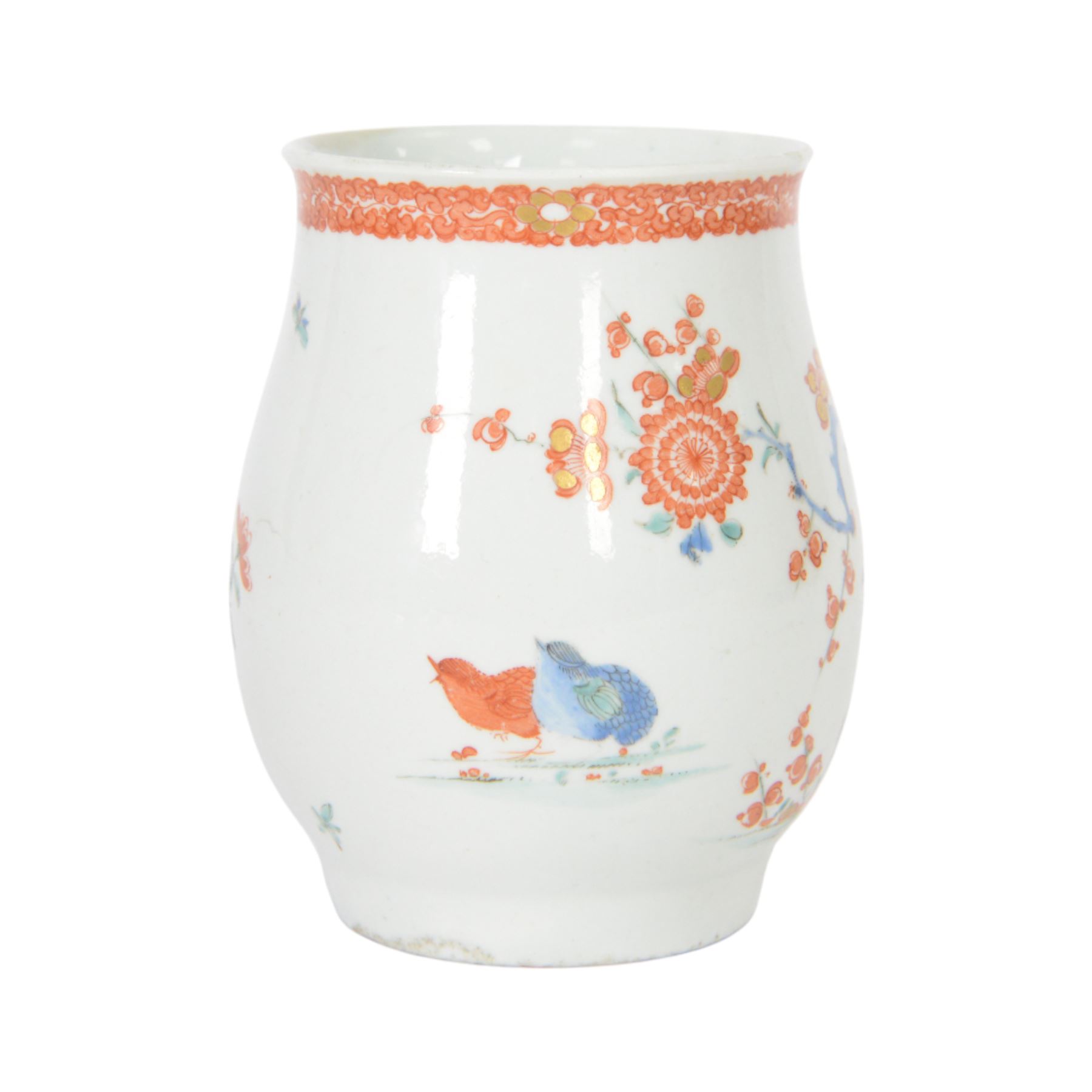 Mid 18th century Worcester mug, circa 1756-1758, of bell form with grooved loop handle, decorated in the Two Quail pattern in the Kakiemon palette with two birds and blossoming prunus trees amongst further flowers, sprigs and insects, bellow an iron red foliate border to rim, H12cm
