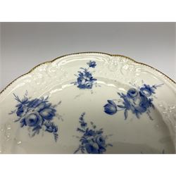 Early 19th century Nantgarw 'Lady Seaton' porcelain plate, circa 1820, hand painted with cobalt blue enamel floral sprays, with shaped and scroll moulded rim within a gilt line, with impressed marks beneath, D25cm