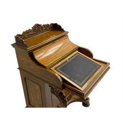 Fine and unusual 19th century olivewood piano top davenport, raised shaped back carved with olive branches and olives, the top hinges to reveal lidded and correspondence compartments, the piano lid enclosing sliding top with hinged and adjustable writing surface with leather inset, right-hand panelled door enclosing four drawers, olive branch and scroll carved cabriole front supports on moulded and shaped platform, turned cup feet with recessed castors 