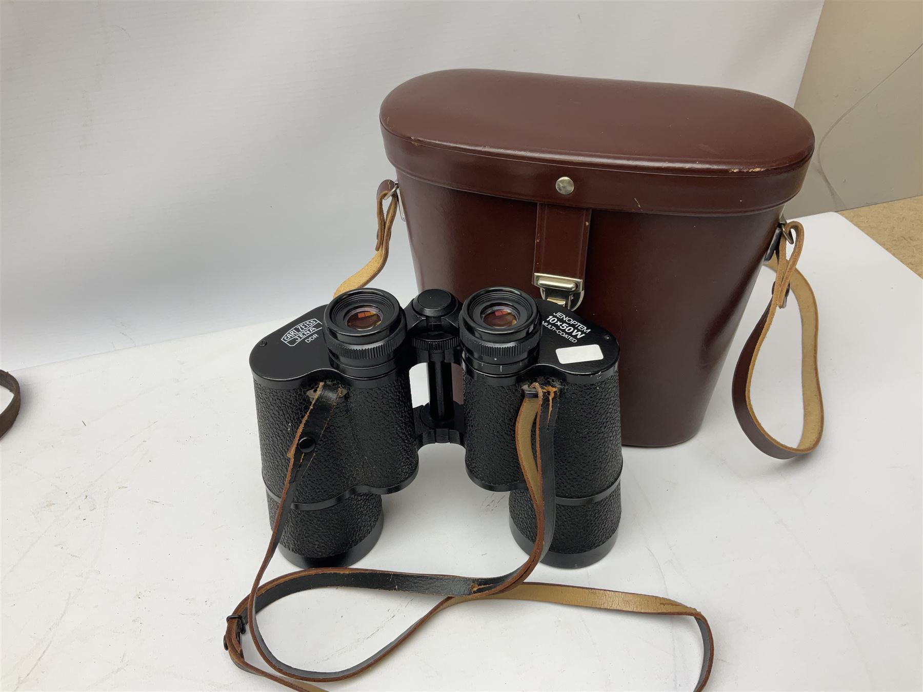 Three pairs of Carl Zeiss Jena binoculars, Jenoptem 10x50W, Jenoptem 8x30W and Jenoptem 10x50, all cased (3)