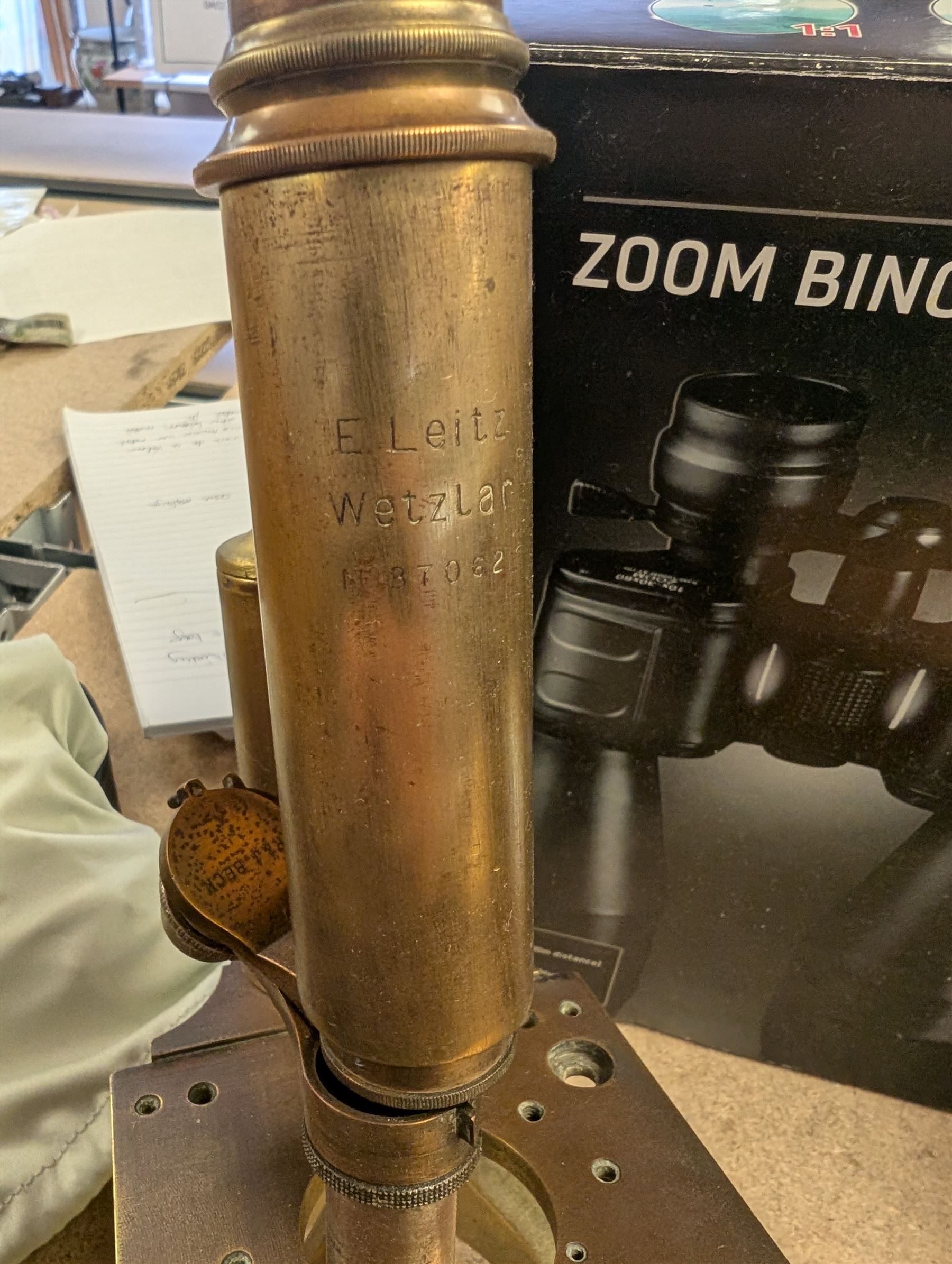 Two Services pocket watches, pair of Auriol Zoom binoculars 10-30 x 60, Sunagor Mini-Pocket binoculars, all boxed, Russian Baigish 8 x 30 binoculars, Oregon 4 binoculars, other binoculars, Prinz Galaxy lens and a Leitz Wetzlar microscope