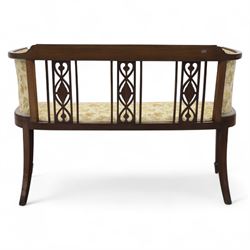 Edwardian mahogany boudoir suite couch, the couch back with three openwork splats inset with oval satinwood panels, the inlaid top rail extending to upholstered outswept ends, raised upon square tapering legs terminating in spade feet