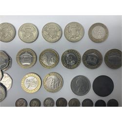 Mostly Great British commemorative coins, including crowns, 1993 five pounds, Beatrix Potter and other similar Queen Elizabeth II fifty pence pieces, commemorative two pound coins etc