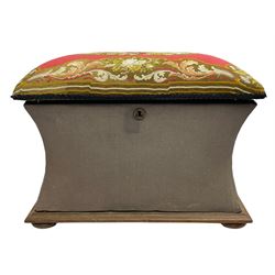 19th century upholstered ottoman, rectangular waisted form with hinged lid, upholstered in needle work cover decorated with floral panels and borders, the interior lined in blue fabric, lower moulded edge over compressed bun feet