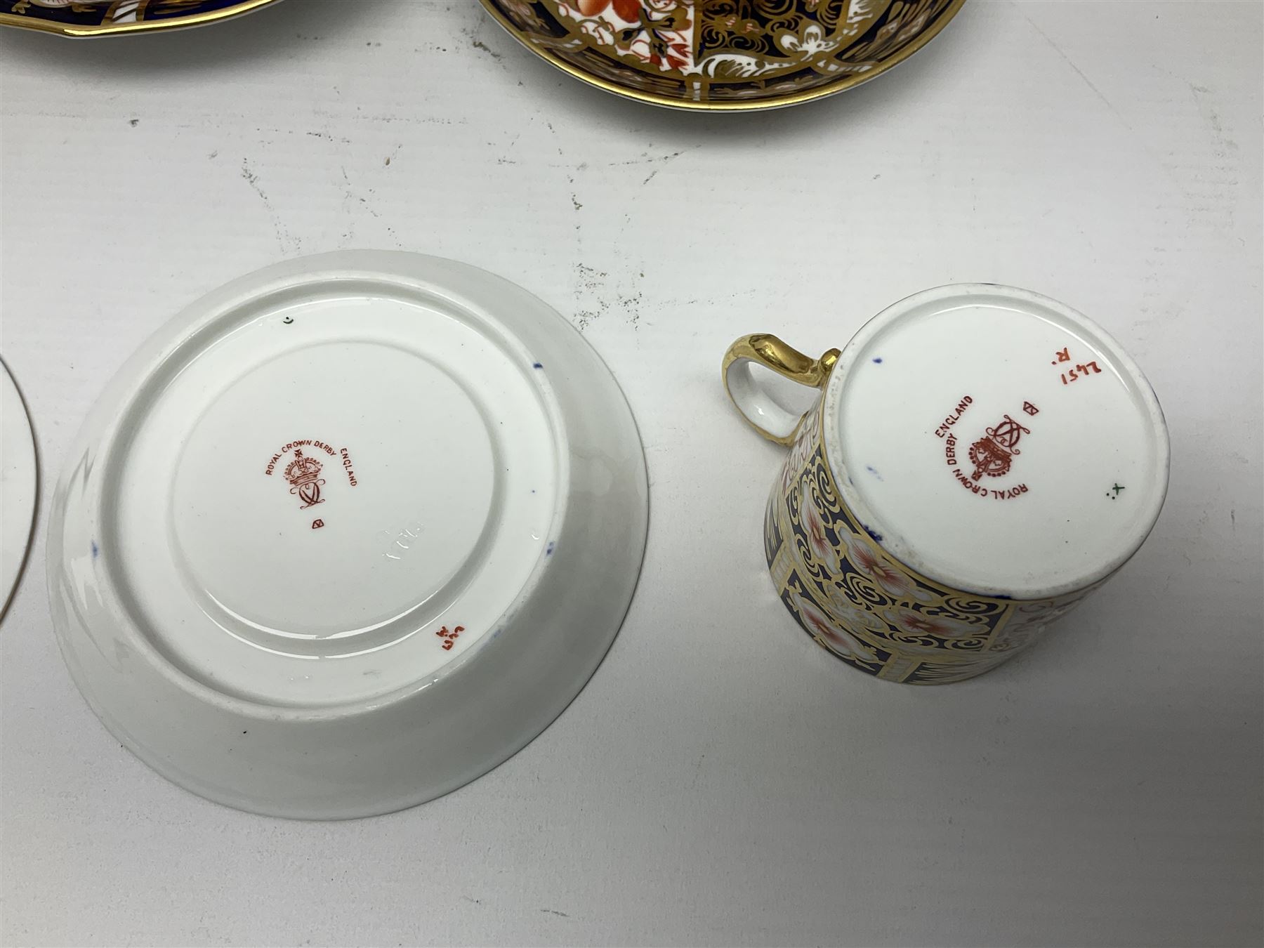 Six Royal Crown Derby cups and saucers all in imari pattern 2451, in various shapes  