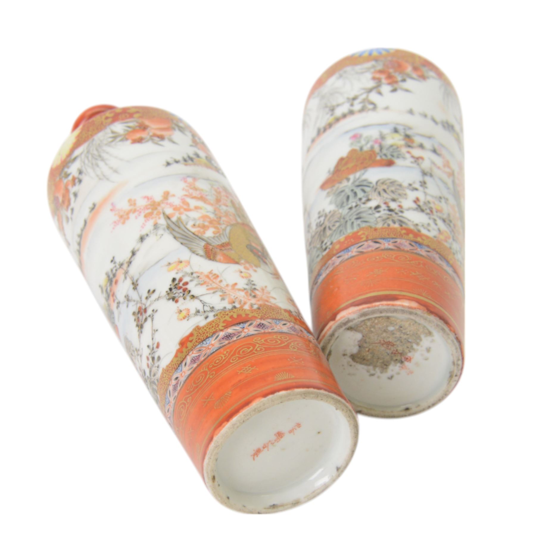 Pair of Japanese Meiji period Kutani vases of slender tapering form, decorated with a bird amongst flowers and trees, each with character marks beneath, H22cm 