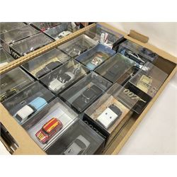 Fabbri James Bond Collection - over one hundred and ten die-cast models in perspex display cases as issued periodically; and a quantity of associated magazines and trading cards, in five boxes