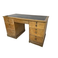 19th century oak twin pedestal desk, fitted with seven drawers, on plinth base