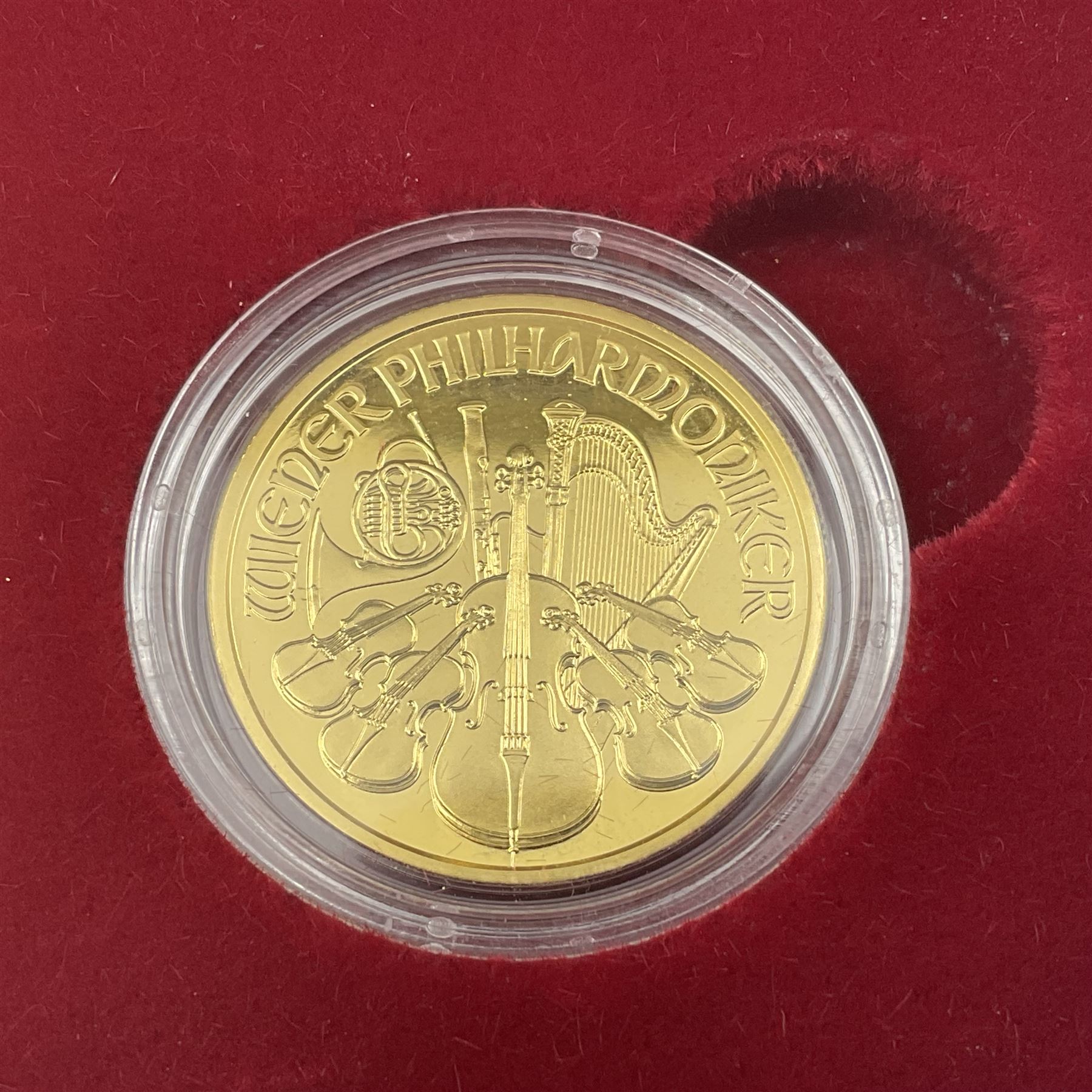 Austria 2014 gold proof two coin set, comprising one ounce fine gold one-hundred Euro and quarter ounce fine gold twenty-five Euro coins, cased with certificate