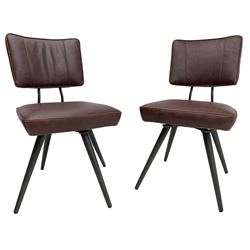 Barker & Stonehouse - pair of 'Sawyer' swivel dining chairs, upholstered in dark maroon leather, on splayed metal supports