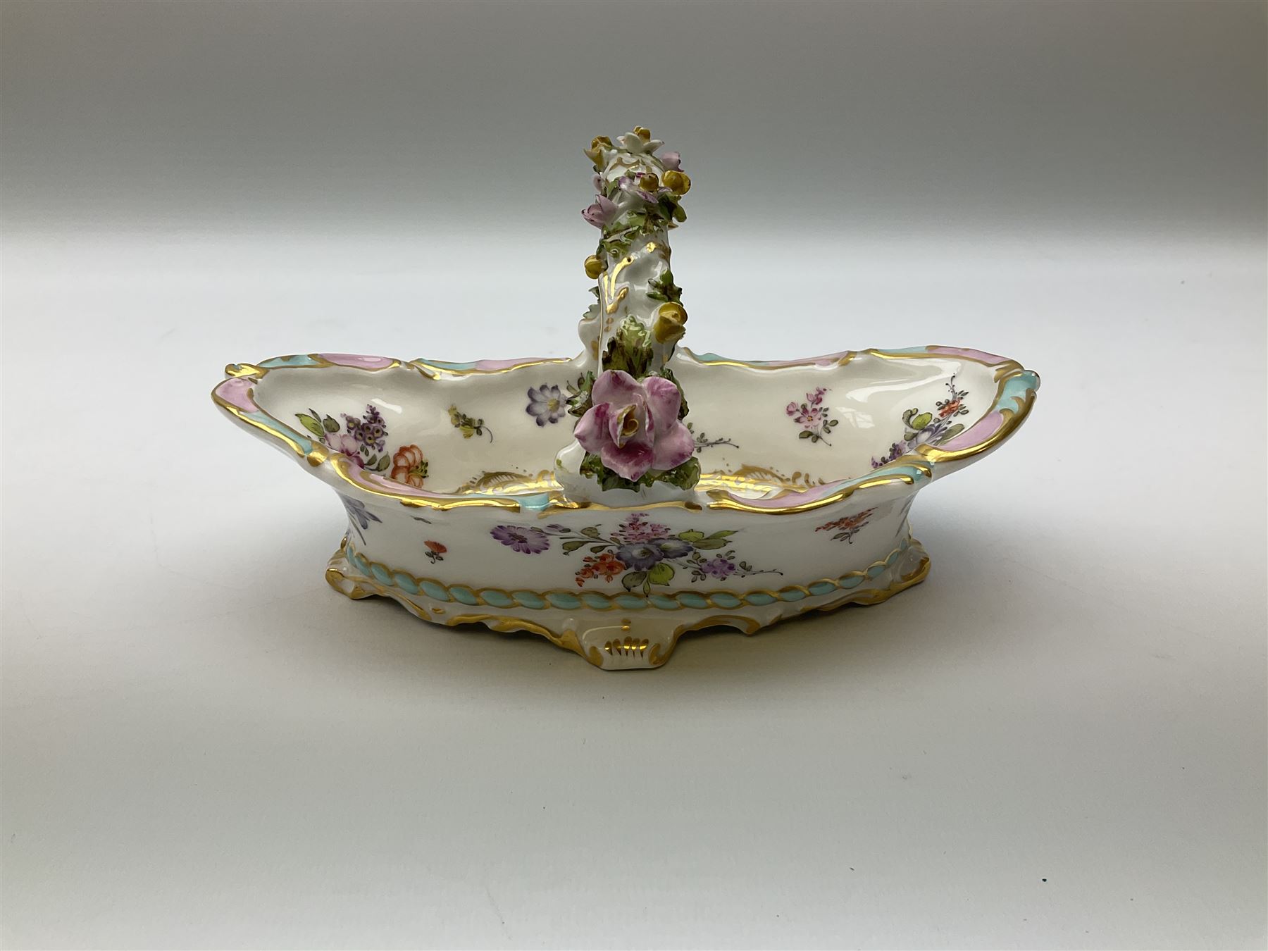 Dresden floral basket, hand painted with floral decoration and gilt scrolls, H12cm, L20cm. 