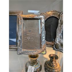 Four silver mounted photograph frames, including Edwardian pair with C scroll and reed and ribbon borders, hallmarked Henry Matthews, Birmingham 1908, tallest H18cm