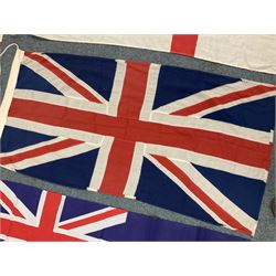 Six flags - White Ensign 180 x 86cm; two Union flags 180 x 86cm and 132 x 62cm; Falklands Islands 153 x 89cm; Yorkshire Rose 153 x 89cm; and QEII 1953 Coronation 84 x 57cm (6)
