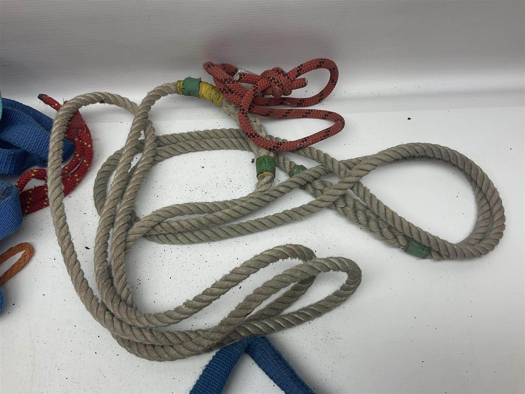 Collection of 1960s/70s climbing equipment including two original Hamish McInnes Pterodactyl ice axes, Joe Brown helmet, carabiners, ropes and wires etc