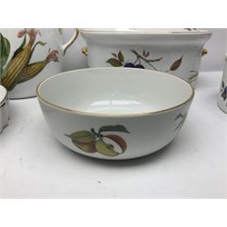 Royal Worcester Evesham pattern, including covered pot de cremes, twin handle tureen, serving dishes, flan dishes, side plates etc  