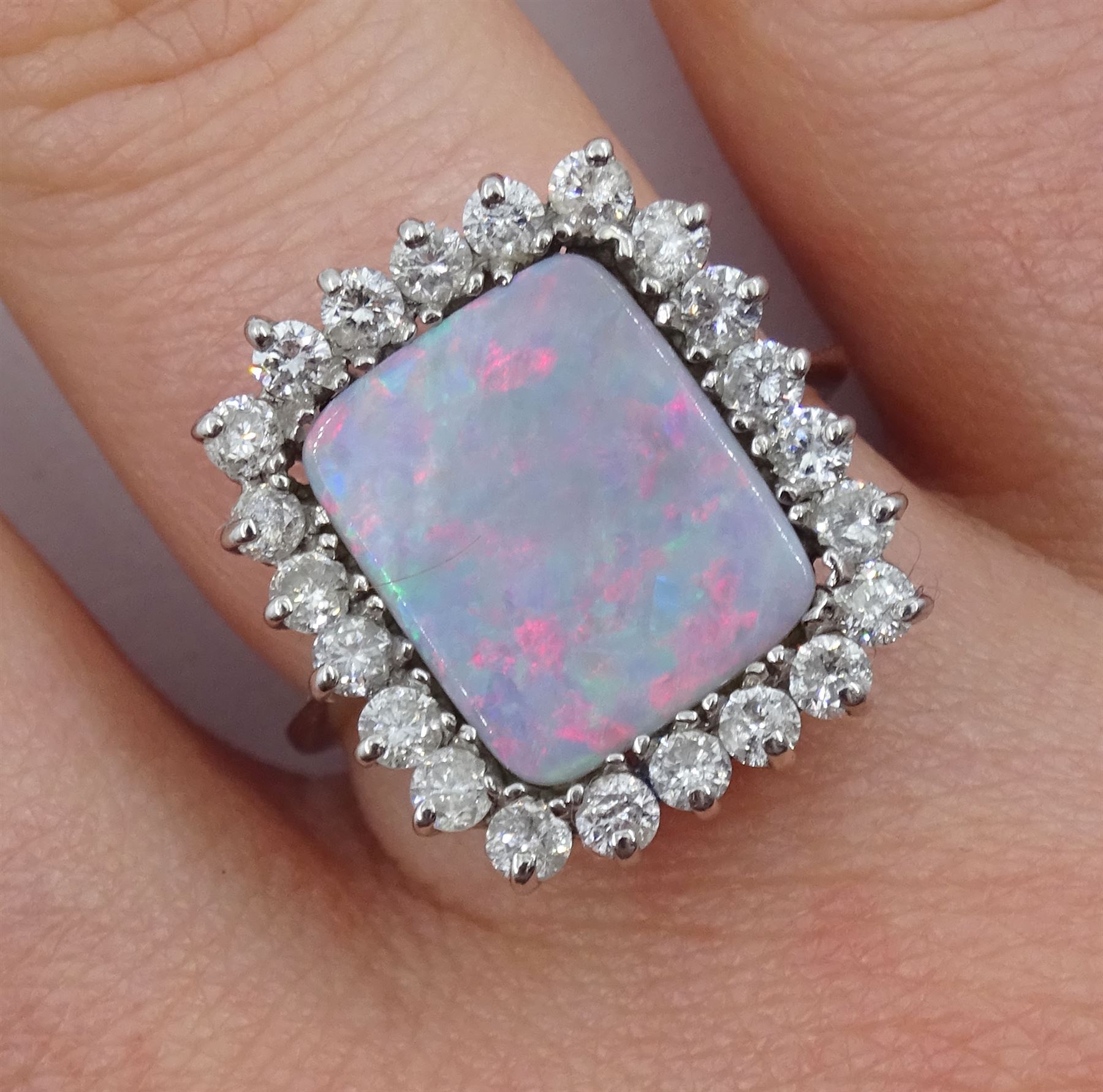 14ct white gold rectangular opal and round brilliant cut diamond cluster ring