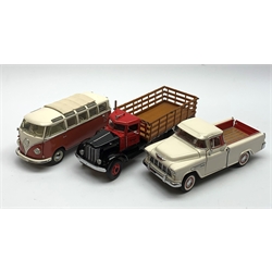 Two Franklin Mint 1:24 scale die-cast models comprising 1962 Classic Volkswagen Microbus and 1955 Chevrolet Cameo Pick-up Truck, both boxed with paperwork; and a Franklin Mint die-cast model of a 1939 Peterbilt truck, boxed (3)