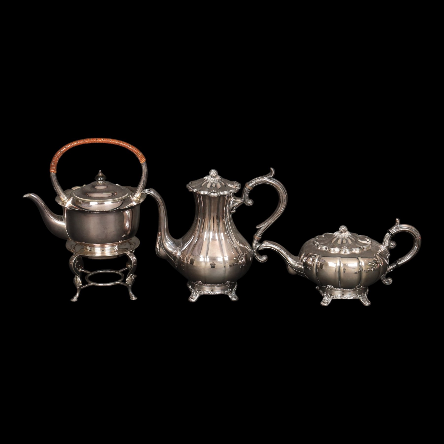 Silver plated four piece melon-shaped tea service by Viners Sheffield, comprising teapot, hot water jug, milk jug and covered sucrier, together with another silver plated tea service 