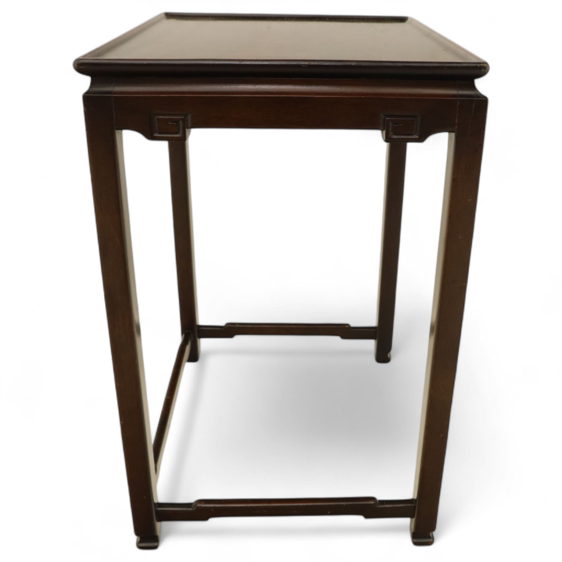 Whytock & Reid, Edinburgh  - Edwardian nest of three Chinese-style solid mahogany occasional tables, rectangular top with finely moulded edge above slim square section legs with subtly chamfered inner edges, joined by H-shaped stretchers, largest W40xD33xH52cm