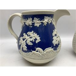 Victorian feldspathic stoneware jug with hunting scene, together with a Victorian Majolica corn jug and another jug 