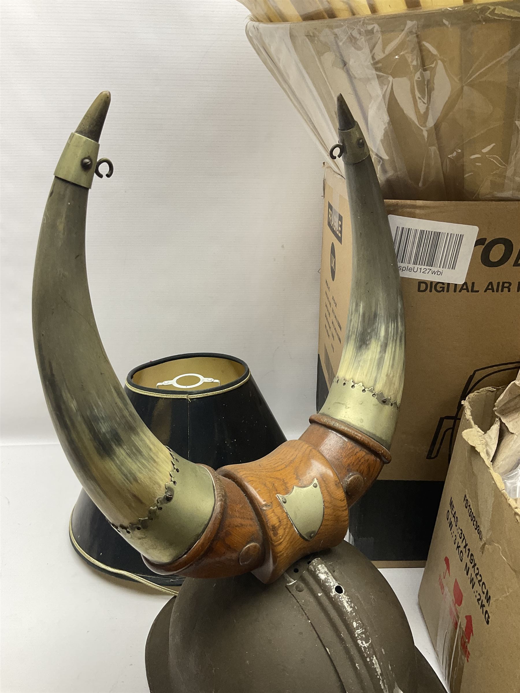 French Adrian helmet and cow horn gong stand; and quantity of lamp shades, etc, helmet H47cm