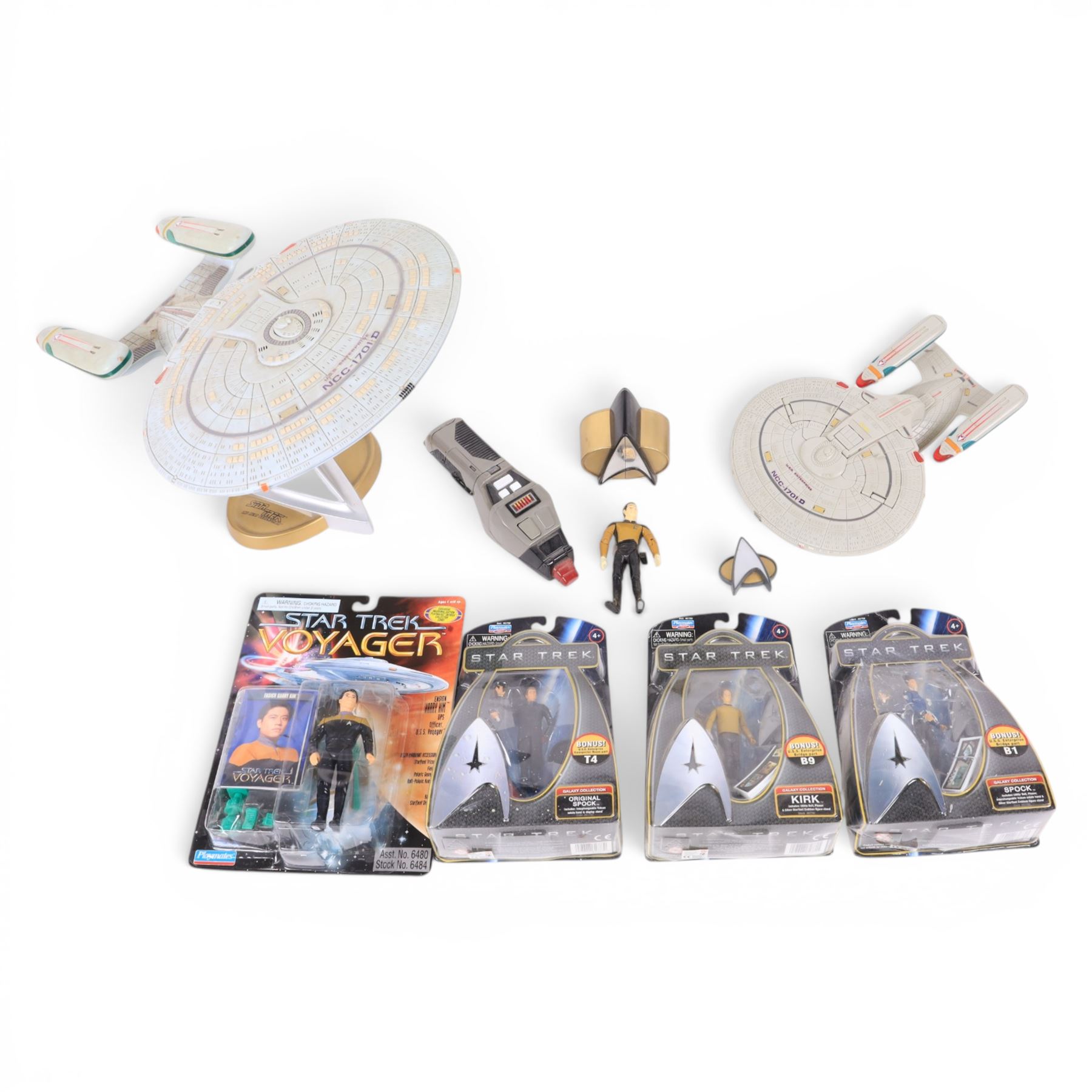 Four carded Playmates Star Trek figures, comprising Ensign Harry Kim, Galaxy Collection Kirk, Original Spock and Spock, together with a small collection of loose Star Trek models and star ships
