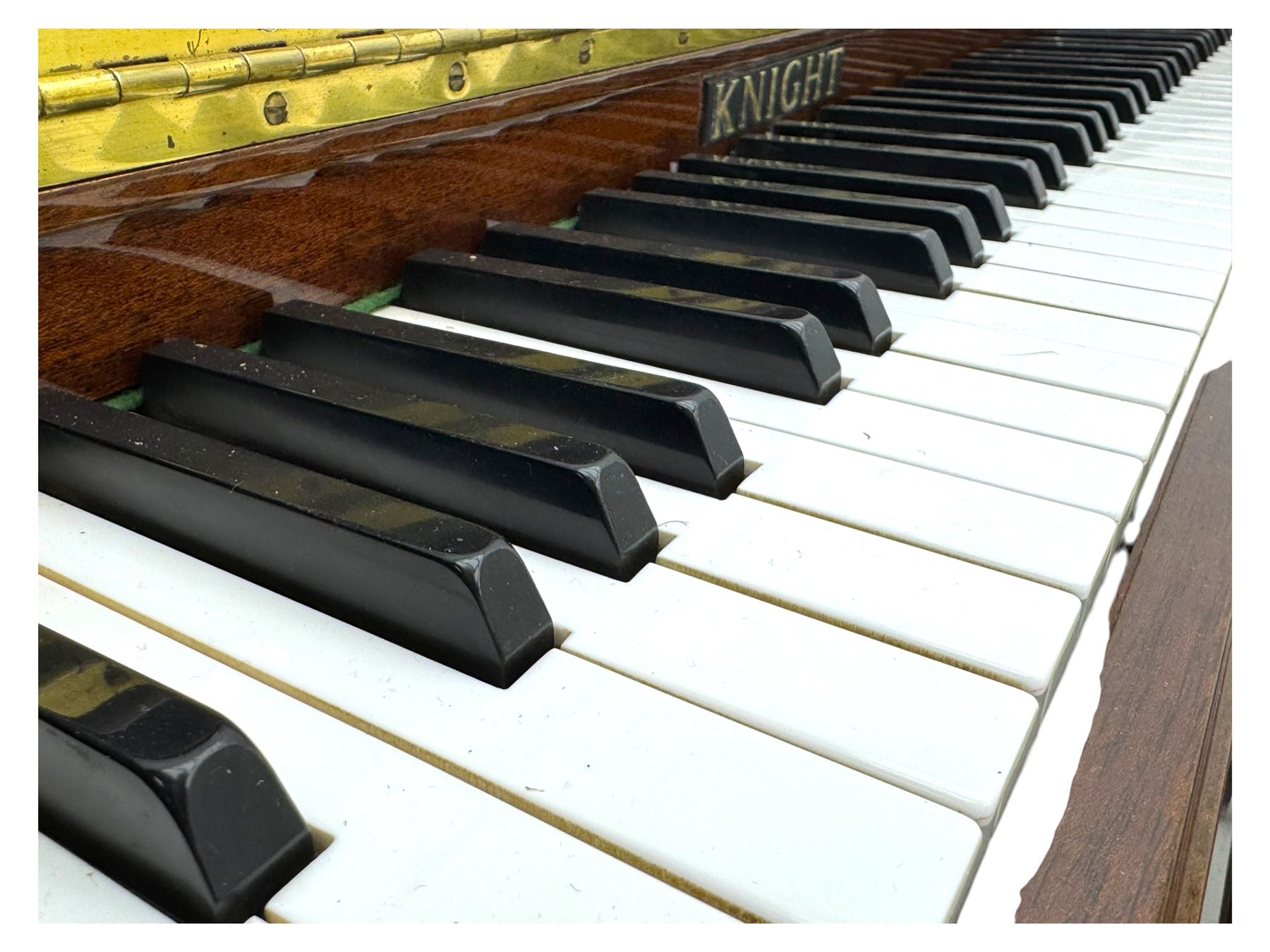 Knight - upright piano in mahogany gloss lacquered case, with stool,  rectangular slide back fall front enclosing full keyboard, with twin brass pedals, cabriole legs 