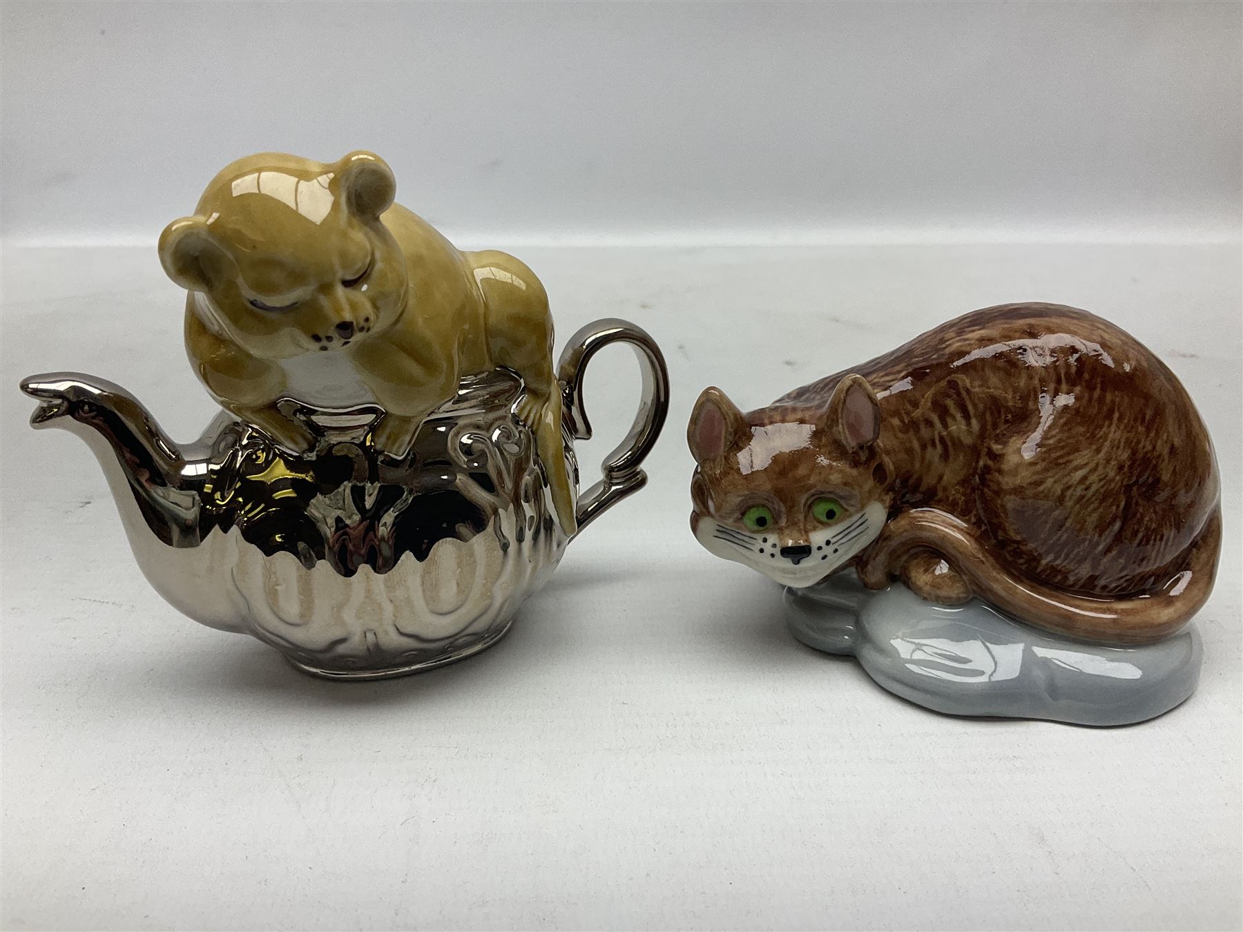 Thirteen Wade Collectors Club figures, comprising six Alice in Wonderland figures; Queen of Hearts, Alice, Mad Hatter, The Doormouse, White Rabbit and Cheshire cat, six Cinderella figures; Fairy Godmother, Cinderella Ready for the Ball, Prince Charming, Cinderella, Clorinda and Thisbe, together with Beauty from Beauty and the Beast, all with original boxes  