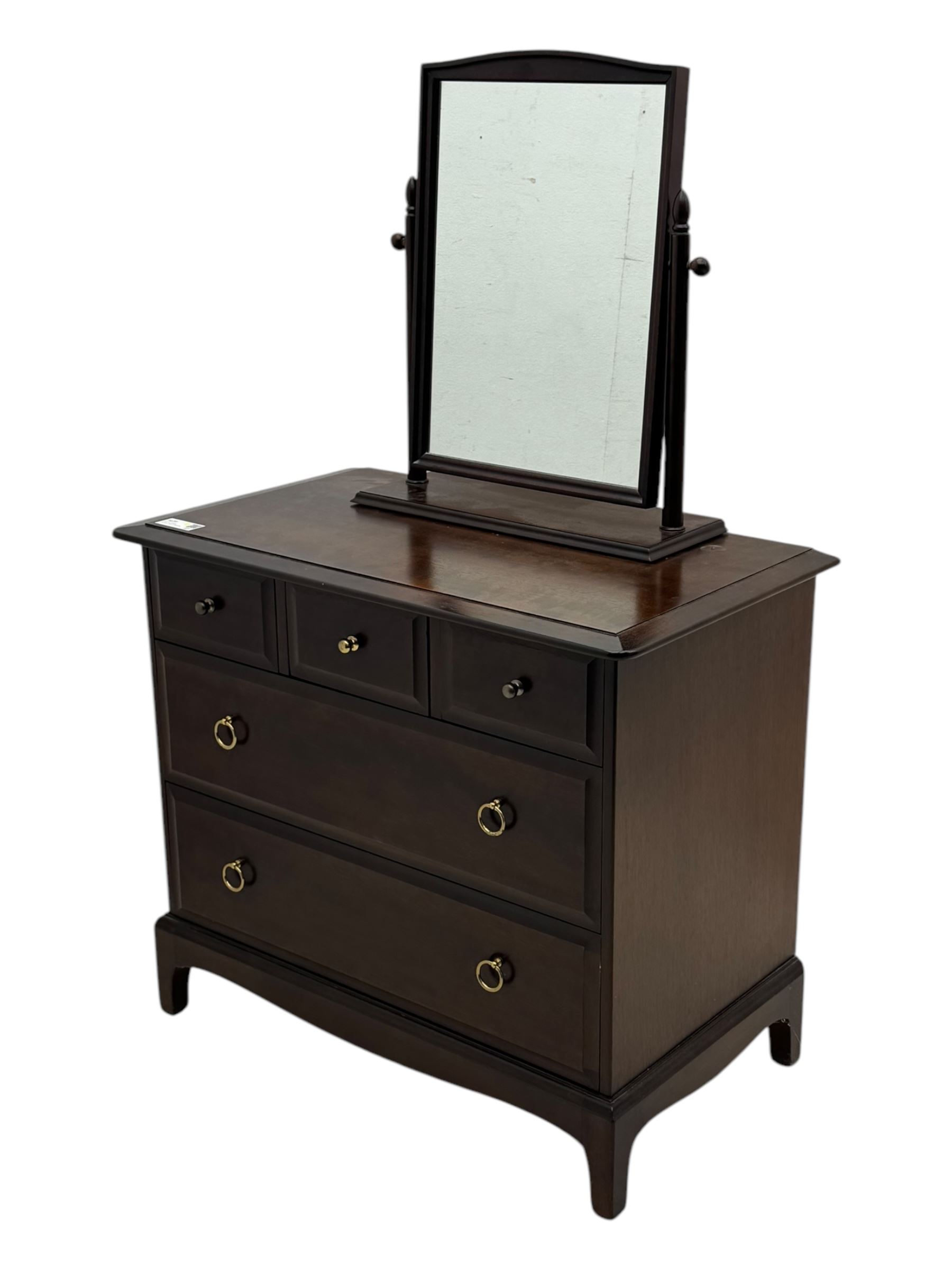Stag Minstrel - mid-20th century mahogany dressing chest, rectangular top over three short and two long drawers, on bracket feet; matching swing mirror on turned supports